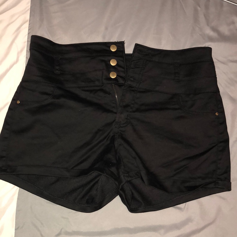 Black shorts/gold buttons